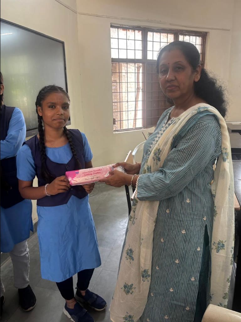 Women receiving welfare and hygiene support from SAANJ